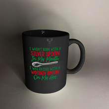 Load image into Gallery viewer, Raised with a Wooden Spoon 11 oz. Black Mug